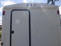 A white 2004 Royal 18 Foot Office Trailer with a single black door and three red lights on top