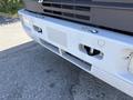 Close-up view of the front bumper and grille of a 1994 Volvo FE 42 showcasing the vehicle's distinctive design elements and features