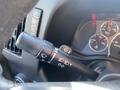 The image shows the control stalk of a 2012 GMC Savana with settings for headlights wipers and signals