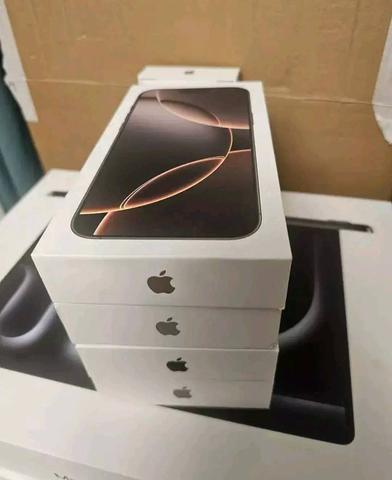 Apple iPhone 16 Pro Max 1TB in white packaging with the Apple logo shown on top of stacked boxes