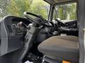 Interior of a 2012 Autocar Xpert featuring a driver's seat steering wheel and dashboard with gauges and controls