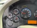 Dashboard gauges of a 2014 International TerraStar showing RPM speedometer water temperature oil pressure and transmission temperature