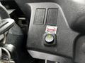 Control panel with two buttons and a green indicator light labeled Transit Monte Charge Lift Gate