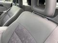 A close-up view of the interior seats of a 2007 Chrysler PT Cruiser featuring gray fabric and patterned upholstery