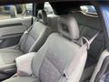 Interior view of a 2007 Chrysler PT Cruiser featuring two front seats with fabric upholstery and headrests
