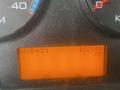 Dashboard of a 2017 International 4300 showing an orange display with the text RN0421 and the mileage of 152144 KM