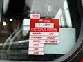 A red certification sticker showing approval details for a 2009 Spartan Gladiator with the year 2025 and months listed from January to September