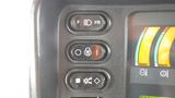 Control panel with three switches and an indicator displaying operational settings of a 2013 Komatsu D37PX-22