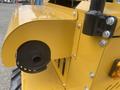 Close-up of a yellow 2024 AGT KRW 23 Mini loader showcasing the engine component and exhaust pipe attachment