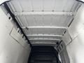 Interior view of a 2021 Mercedes-Benz Sprinter van showing the ceiling structure and cargo area without any items inside