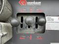 A panel with multiple control levers labeled for firetruck operations including right lower retract and raise