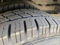 Close-up view of a tire tread showing detailed patterns and grooves on a 2020 Chevrolet Express