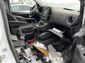 Interior of a 2018 Mercedes-Benz Metris showing a driver seat steering wheel and scattered items on the floor