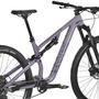 A 2025 Canyon Neuron 5 mountain bike in purple featuring a full suspension frame wide tires and modern components designed for trail riding