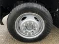 Close-up of a 2017 Ford F-550 wheel with a silver rim and tire showing the tread pattern and manufacturer branding