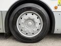 Close-up of a tire mounted on a 2018 Grande West Vicinity bus showcasing the rim design and tire tread pattern