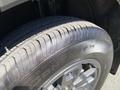 Close-up of a tire on a 2023 Ford Bronco Sport showing the tread pattern and brand name on the sidewall