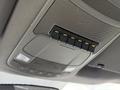 Overhead control panel with multiple switches labeled AUX in a 2017 Ford F-350 SD