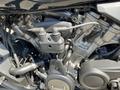 Close-up of a 2021 Harley-Davidson RA1250 S motorcycle engine showing the intricate mechanics and components including wires and pipes