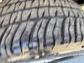 Close-up of a tire from a 2017 Ford F-350 SD showing detailed tread pattern and texture