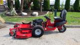 2014 Ferris Mower ISX 800 with a red body and black seat featuring a rear engine and a large mowing deck on one side