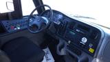 Interior of a 2014 Freightliner Thomas Bus Diesel showcasing the dashboard steering wheel and control panel features