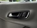 2023 Ford Transit door handle featuring a sleek black design with buttons for locking and unlocking the vehicle