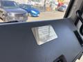 A metal plaque on the dashboard of a 1994 Volvo FE 42 indicating it was built for the Osoyoos Fire Department dated October 21 1993