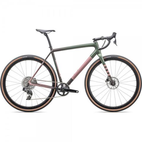 2025 Specialized Crux Expert Carbon Gravel Bike featuring a sleek design with a gradient finish in green and pink and equipped with wide tires and a modern gear system