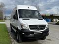 A white 2017 Mercedes-Benz Sprinter van parked, featuring a prominent front grille with the Mercedes logo and an enclosed cargo area