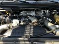A detailed view of the engine of a 2008 Ford F-550 featuring a Power Stroke V8 Turbo Diesel engine with various components and tubes visible