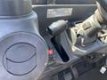 Interior control panel of a 2018 Kubota RTV-X 1100 C featuring a gear shift lever and various controls for vehicle operation