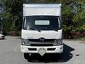 Front view of a white 2020 Hino 155 box truck with a large cargo area and prominent Hino logo on the grille