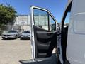 2019 Mercedes-Benz Sprinter with an open driver's side door showcasing the interior and dashboard details