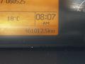 Dashboard display of a 2005 Volvo VND 122 showing the time as 08:07 AM the temperature as 18°C and the odometer reading as 4610125 km