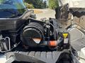 Close-up of the engine compartment of a 2008 International DuraStar showing the turbocharger and various engine components