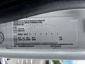 A 2017 International WorkStar 7600 vehicle identification label detailing specifications and vehicle information