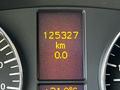 A digital dashboard display showing odometer reading of 125327 km and a trip meter reading of 0.0