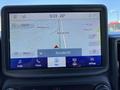 A 2023 Ford Bronco Sport displays a navigation screen showing a map with a highlighted route and locations including Burnaby BC