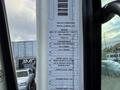 2010 Autocar Xpeditor with engine specifications and transmission details displayed on a label attached to the vehicle