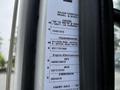 A close-up of a label displaying specifications for a 2012 Autocar Xpert including engine details transmission model and serial numbers