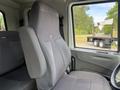 A driver’s seat from a 2011 International 4300 truck featuring a gray fabric design with a high back and adjustable headrest