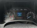 Dashboard of a 2018 Ford F-550 displaying speedometer tachometer fuel gauge and outside temperature reading 16 degrees Celsius with odometer showing 140359 kilometers
