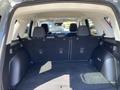Interior view of a 2023 Ford Bronco Sport showing the spacious cargo area with the rear seats folded down