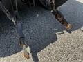 2018 New Holland Boomer 45 tractor hitch with two arms extended downward showing wear and minor rust on the metal components