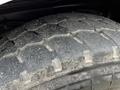 Close-up of a worn tire tread on a 2009 Spartan Gladiator showing rough texture and signs of use