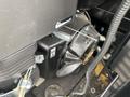 Close-up view of the engine compartment of a 2024 AGT Industrial QH13R Mini Excavator showing various components and wiring