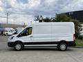 A white 2022 Ford Transit van parked with a smooth body design and four wheels visible