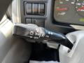 Close-up of the turn signal and light control lever in a 2009 Ford LCF 550 dashboard with various settings indicated