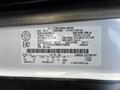 2021 Ford Transit with a vehicle identification number and specifications label attached